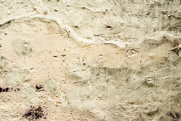 Texture of a concrete wall with cracks and scratches which can be used as a background
