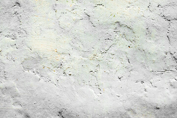 Obraz premium Texture of a concrete wall with cracks and scratches which can be used as a background
