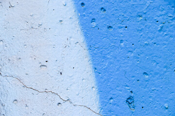 Wall texture painted with blue paint. Empty template and background.