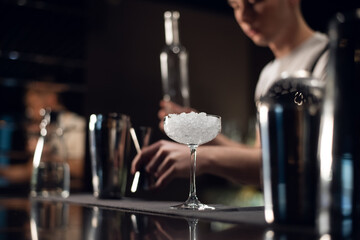 beautiful glass of ice on the bar close up.
