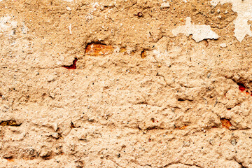Texture of a concrete wall with cracks and scratches which can be used as a background