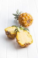 Ripe baby pineapple. Halved mini pineapple.