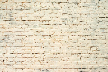 Obraz premium Texture of a brick wall with cracks and scratches which can be used as a background