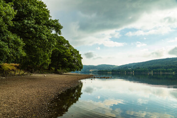 Low Water At Coniston / An image showing the low water levels at Coniston Water during the hot summer of 2018 in the UK, shot in the Lake District, Cumbria, UK.