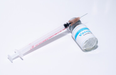 A single bottle vial of Covid-19 coronavirus vaccine in a research medical lab. 
