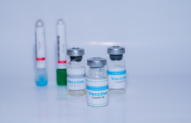 A single bottle vial of Covid-19 coronavirus vaccine in a research medical lab. 