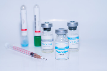 A single bottle vial of Covid-19 coronavirus vaccine in a research medical lab. 