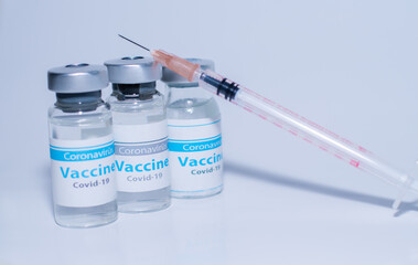 A single bottle vial of Covid-19 coronavirus vaccine in a research medical lab. 