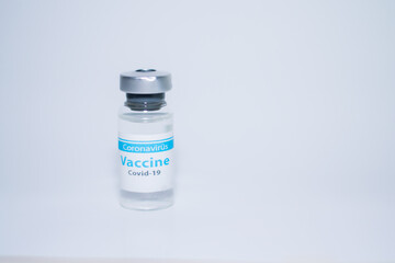 A single bottle vial of Covid-19 coronavirus vaccine in a research medical lab. 