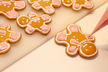 Plain gingerbread man on white background. Ideal as simple concept or with your customized decorations and text added.