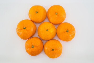 Ripe citrus tangerines isolated on a white background.
