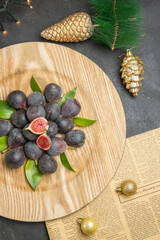 top view fresh sweet figs inside plate around toys on a dark background fruit dark photo taste xmas
