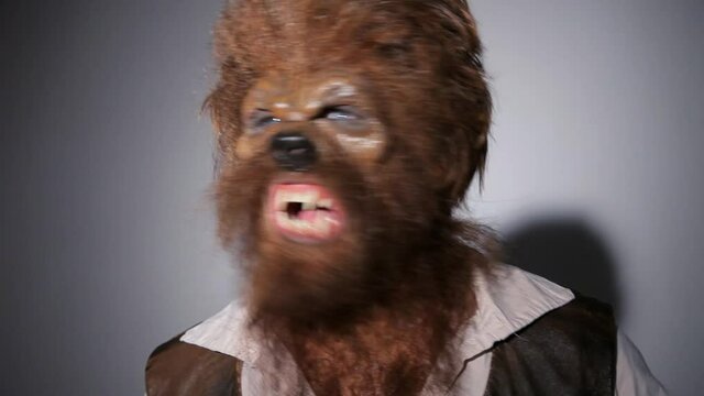 Close up of angry male werewolf swaying and growling