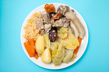 typical portuguese dish cozido a portuguesa on white dish