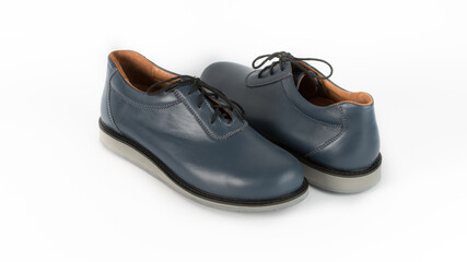 children's blue orthopedic shoes on a white background