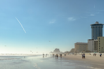 A faint vapor trail of a rocket from Daytona Beach, FL