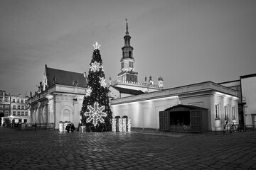 The Market Square with historic tenement houses, tower of town hall and christmas decorations