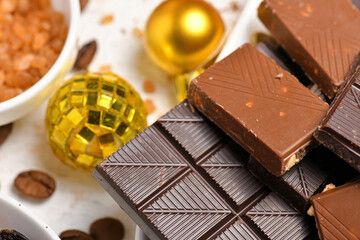 sweet food top view background for merry christmas or new year holiday decoration - chocolate candies, tangerines, cookies on white wood