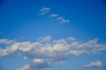 Blue sky with abstract gray clouds