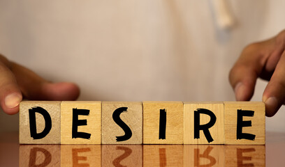 DESIRE word on wooden cubes