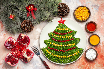 top view tasty green salad in new year tree shape with seasonings on light background color salad meal xmas photo