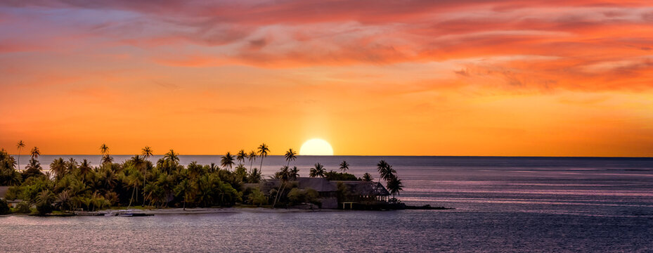 Sunset in Tahiti with pink sky