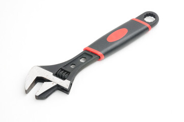Adjustable wrench on a white background