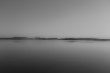 black and white fog on the lake