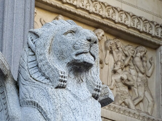Stone lion statue at the entrance of the Basilica of Notre Dame de Fourvière in Lyon