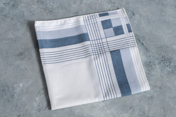 Blue white Handkerchief for men on grey background.
