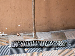 Broom Leaning Against The Wall, Selected Focus With Copy Space