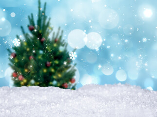 Fototapeta na wymiar Snow and blurred view of beautiful decorated Christmas tree. Bokeh effect