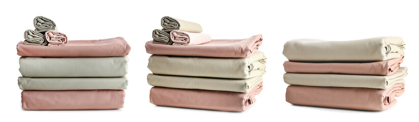 Set with stacks of clean bed linen on white background. Banner design