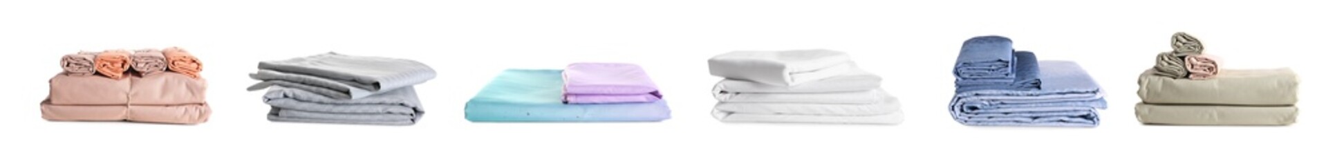 Set with stacks of clean bed linen on white background. Banner design