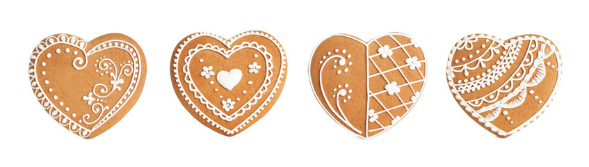 Set of Christmas gingerbread heart shaped cookies on white background. Banner design