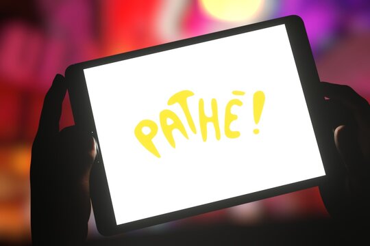 Logo of film production and distribution company Path&eacute; displayed on tablet screen. Editorial 3d rendering.