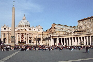 Fototapeta na wymiar People gather at the St Peter's square to attend the Easter celebration led by Pope Benedict XVI in Vatican city.