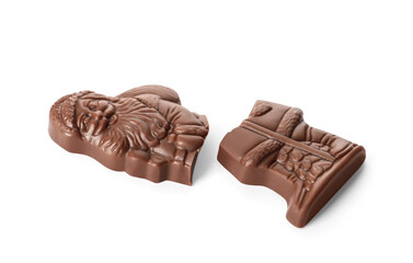 Pieces of chocolate Santa Claus candy on white background