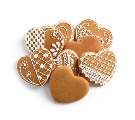 Tasty heart shaped gingerbread cookies isolated on white, top view