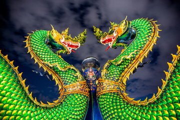 Obraz premium Wat Khao Phra Kru,Landmark of sriracha city with two of great Nagas guarded entrance to the view point and the crystal ball that gives an inverted view of the Sriracha scenery,Chonburi,Thailand