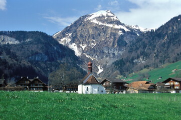 Fototapeta na wymiar View of Lake Lungern valley and village in Obwalden, Switzerland.