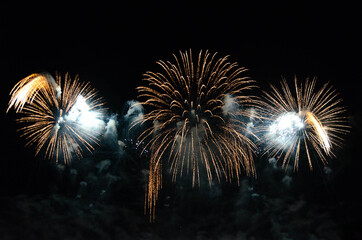 Fireworks illuminates the sky with a dazzling display. Colorful fireworks with bokeh background. Abstract festive background