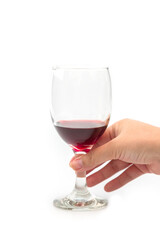 Holding a glass of red wine