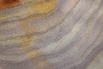 Striped slopes of natural stone mountain walls