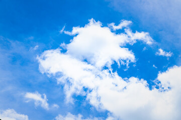 Blue sky and white fluffy clouds