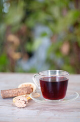 A cup of black tea on the table
