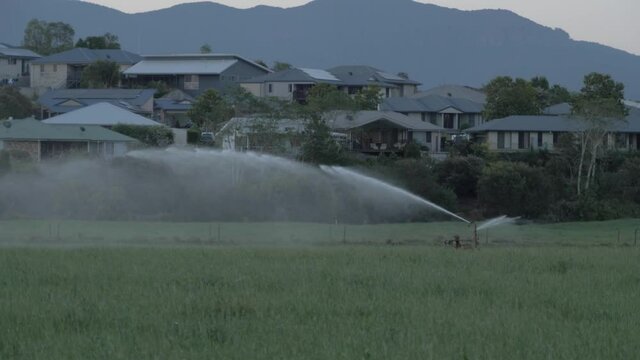 Farm Sprinkler Equipment In Wollumbin National Park - Closed Due To Coronavirus Pandemic - Mount Warning In Tweed Range, NSW, Australia - slow motion