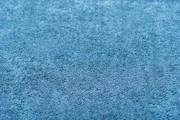 白背景で撮影した青いフェイスタオル