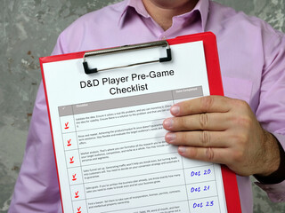 Business concept about D&D Player Pre-Game Checklist with phrase on the sheet.