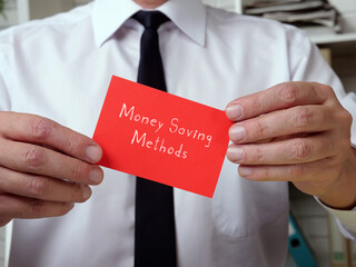 Business concept about Money Saving Methods with sign on the piece of paper.